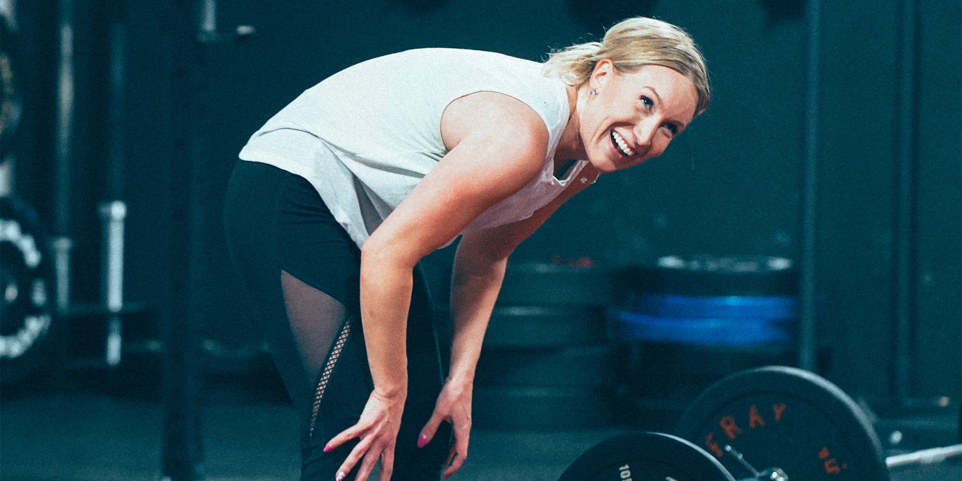 happy woman training at TRVFIT Highland