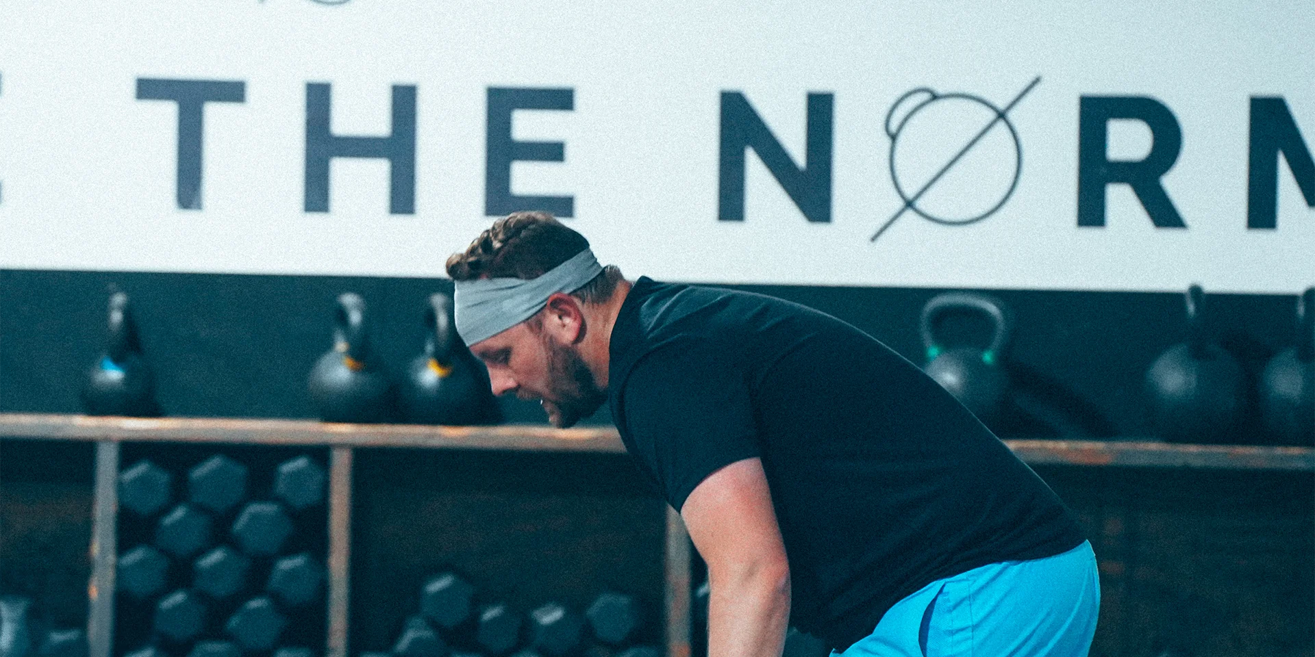 man training with dumbbells at TRVFIT Highland
